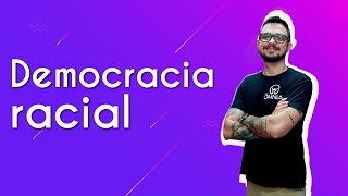 "Democracia racial" escrito sobre fundo roxo ao lado da imagem do professor