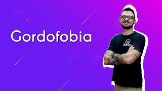 Professor ao lado do texto"Gordofobia"em fundo roxo.