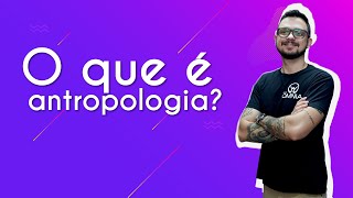 "O que é antropologia?" escrito sobre fundo roxo ao lado da imagem do professor