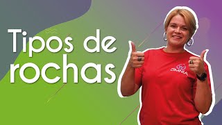 "Tipos de rochas" escrito sobre fundo verde ao lado da imagem da professora