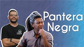"Questões étnico-raciais: uma análise a partir de Pantera Negra" escrito sobre fundo azul ao lado da imagem do rapper Vitor Hugo