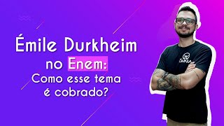 "Émile Durkheim no Enem: como esse tema é cobrado?" escrito sobre fundo roxo ao lado da imagem do professor