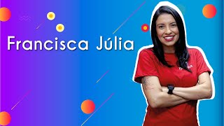 Professora ao lado do texto"Francisca Júlia".