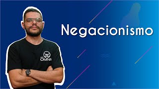 "Negacionismo" escrito sobre fundo azul ao lado da imagem do professor