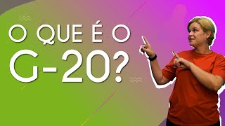 "O que é o G-20?" escrito sobre fundo colorido ao lado da imagem da professora