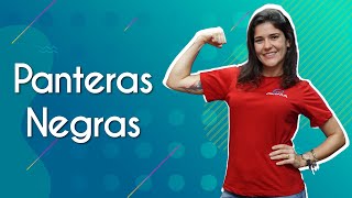 Professora ao lado do texto"Panteras Negras".