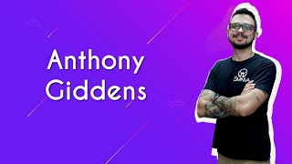 Professor ao lado do texto"Anthony Giddens" em fundo roxo.