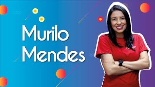Professora ao lado do texto"Murilo Mendes".