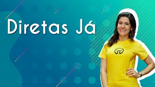 Professora ao lado do texto"Diretas Já" em fundo azul.