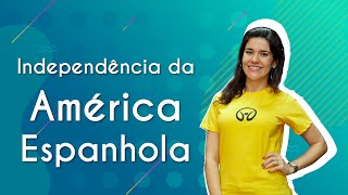 Professora ao lado do texto"Independência da América Espanhola".