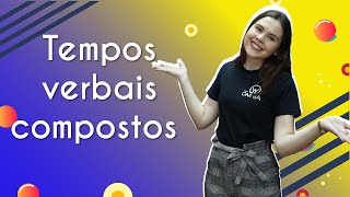 Professora ao lado do texto"Tempos verbais compostos".