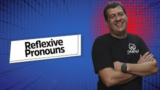 "Reflexive Pronouns" escrito sobre fundo azul ao lado da imagem do professor