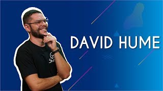 Professor ao lado do texto"David Hume".