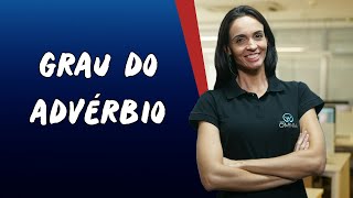 Professora ao lado do texto"Grau do advérbio".