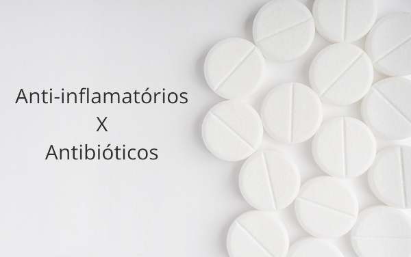 Comprimidos brancos representando anti-inflamatórios e antibióticos.