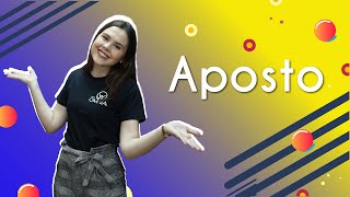 Professora ao lado do texto"Aposto ".