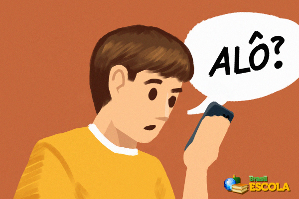 Pessoa falando “alô?” no telefone como exemplo de função emotiva ou expressiva, uma das funções da linguagem.