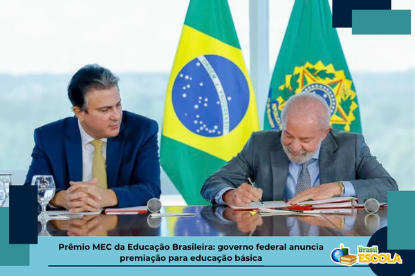 Camilo Santana de Lula da SIlva assinando papel. Texto: título da notícia