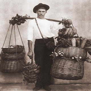Fotografia de um vendedor ambulante de frutas, por Marc Ferrez (1843-1923)