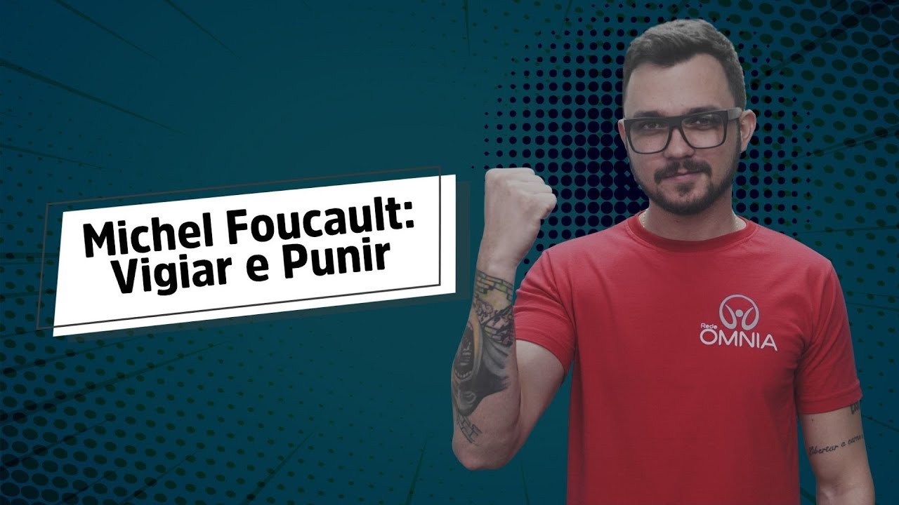 Professor ao lado do texto"Michel Foucault: Vigiar e Punir".