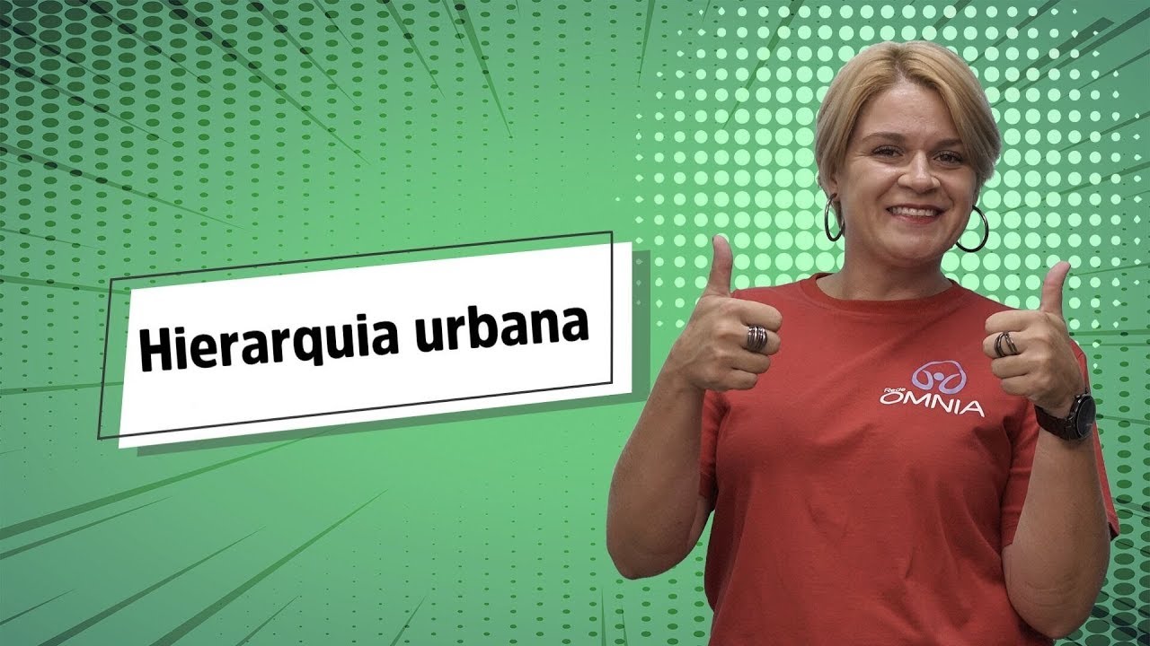 Professora ao lado do texto"Hierarquia Urbana".