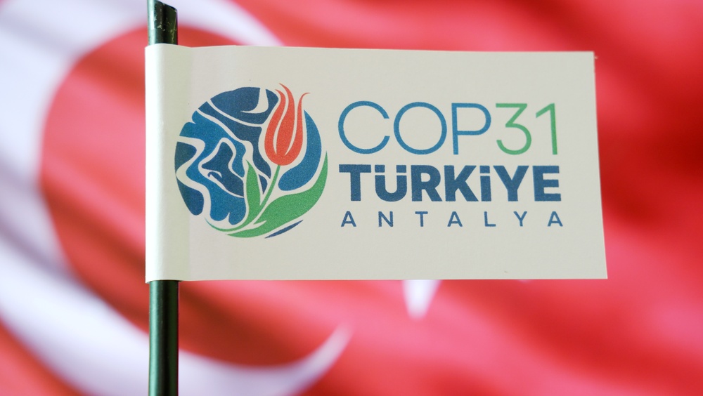 Bandeira da Conferência das Nações Unidas sobre Mudanças Climáticas de 2026. 