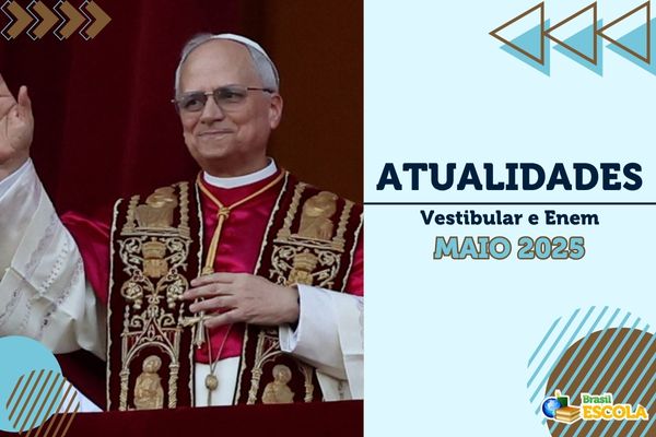 Jovem estudando atualidades para os vestibulares e para o Enem.